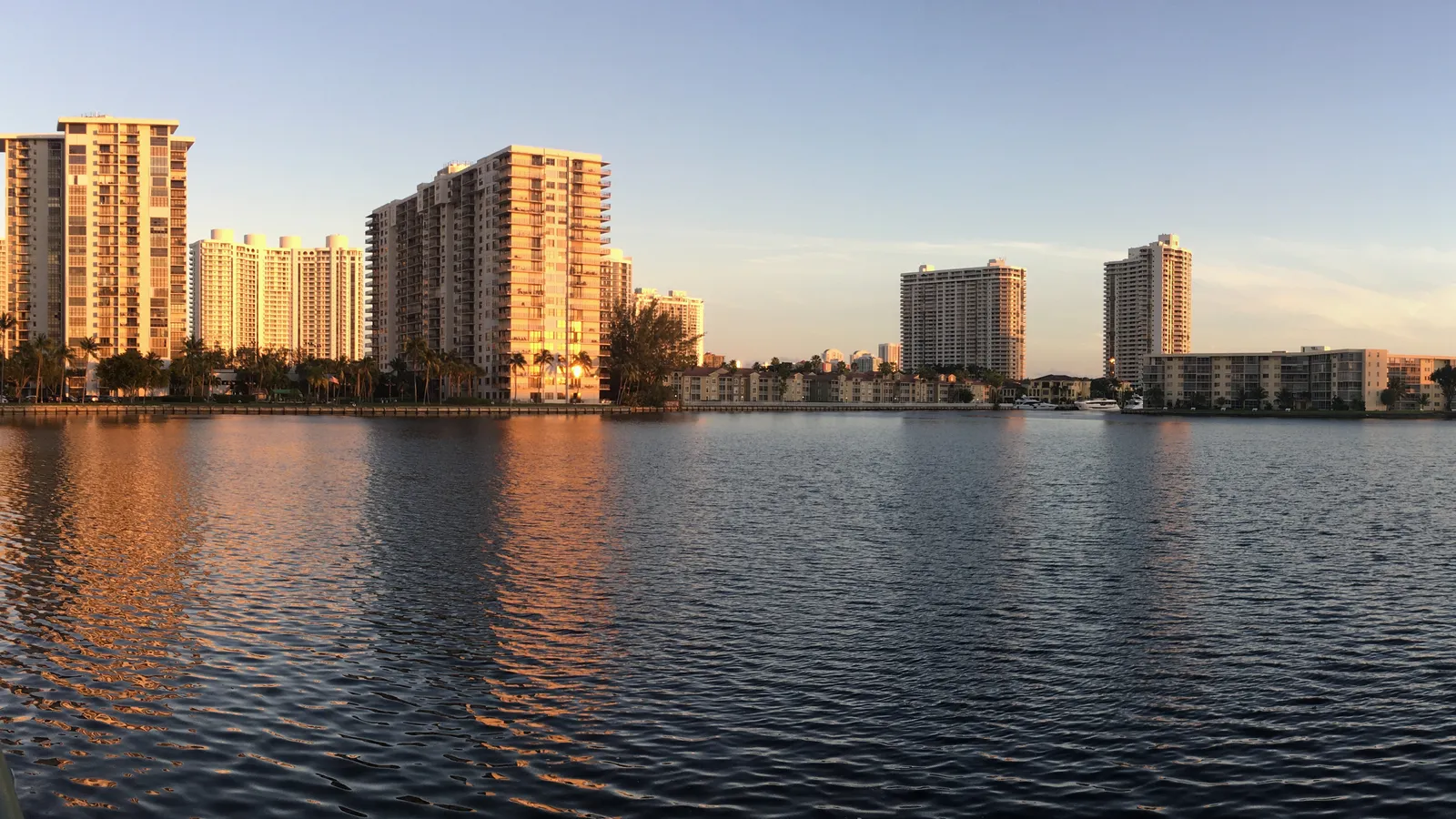 Condo towers along the water near NE 183rd Street at sunset, Aventura, Florida