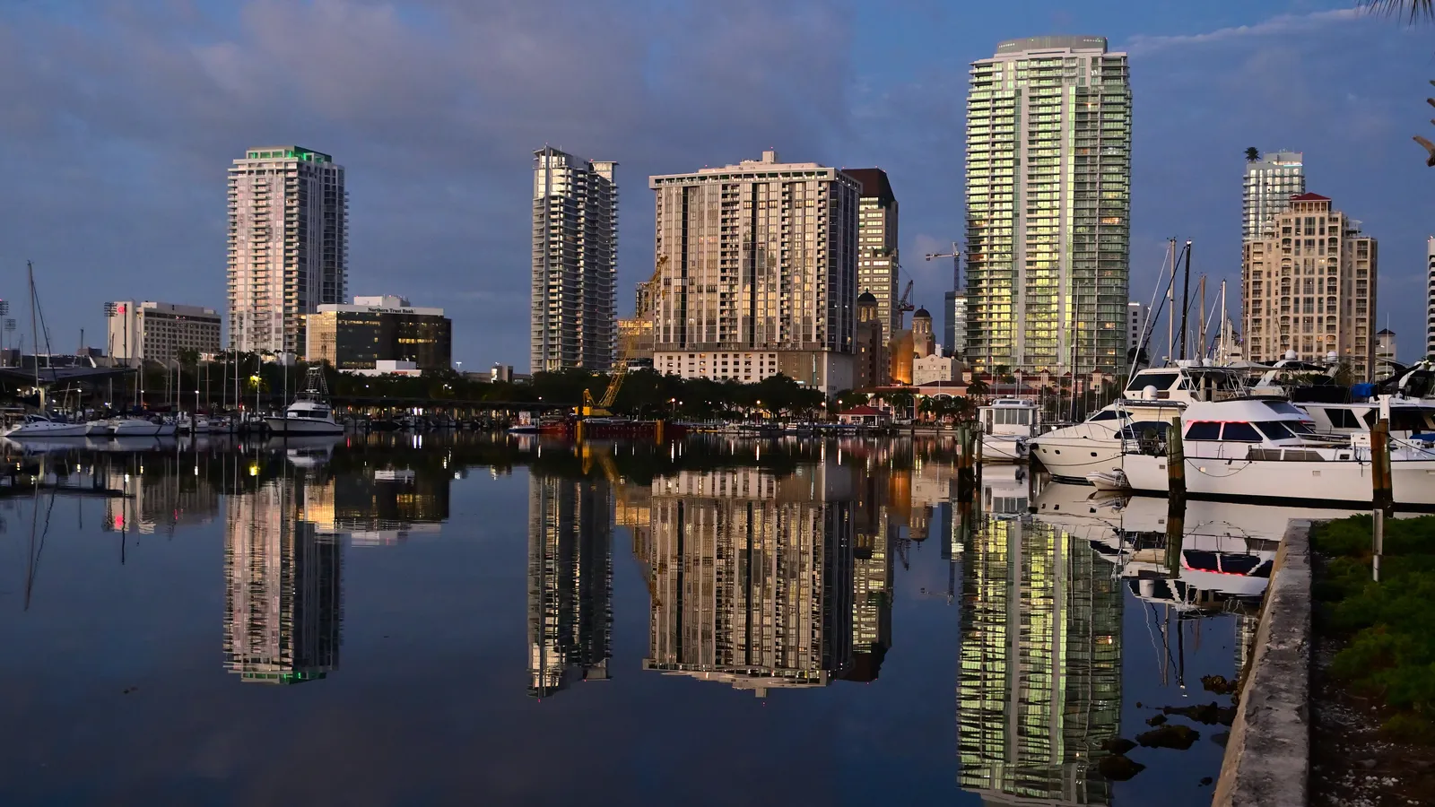 Downtown St. Petersburg condo towers reflected in the marina at sunrise, St. Petersburg, Florida